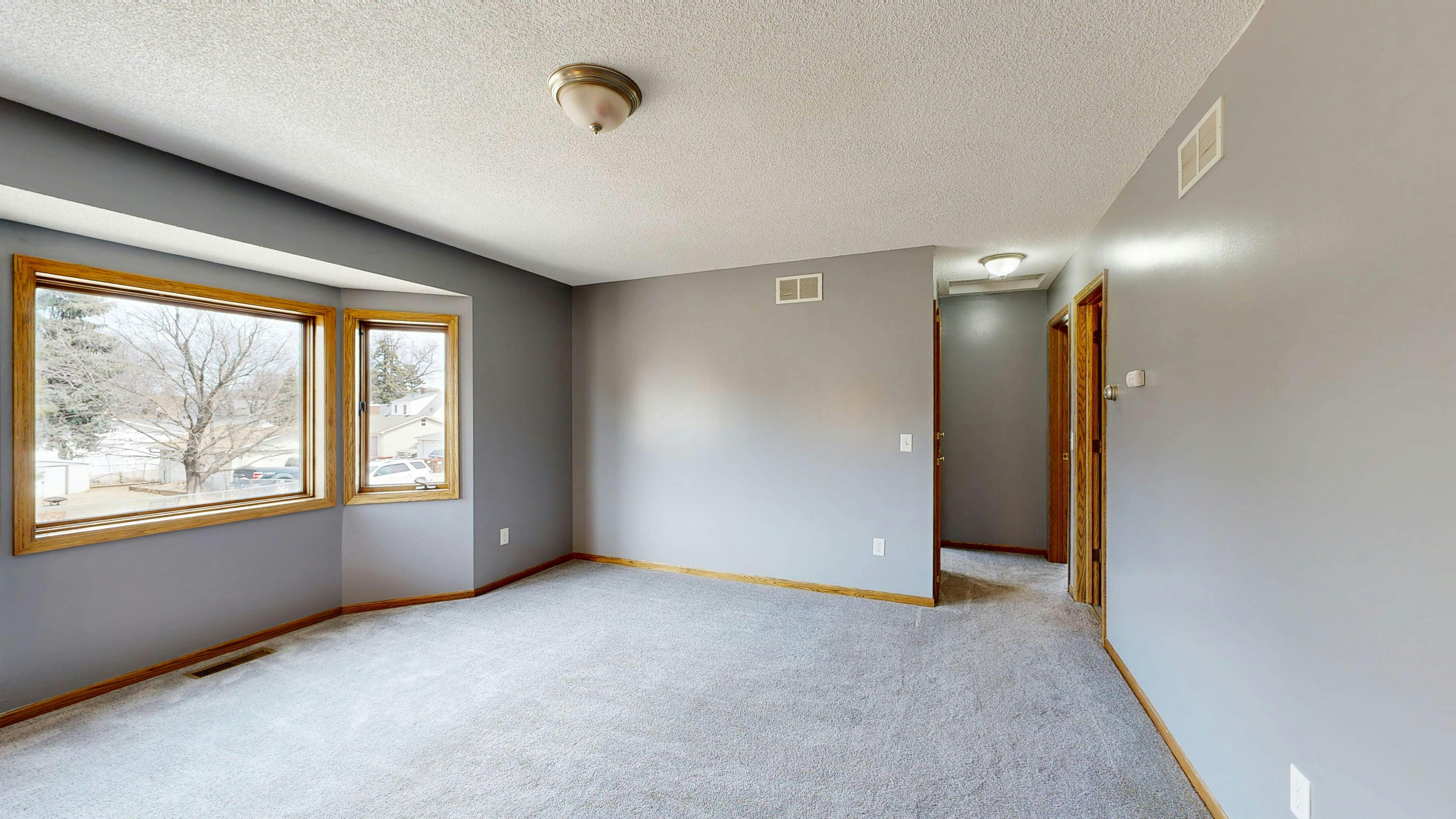Empty living room before redesign